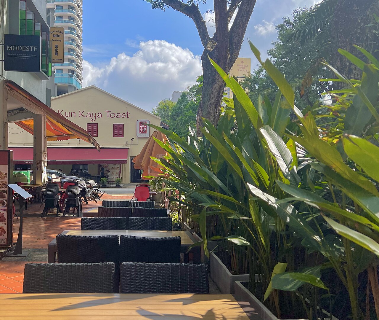 Outdoor tables at a traditional kaya toast kopitiam in Singapore